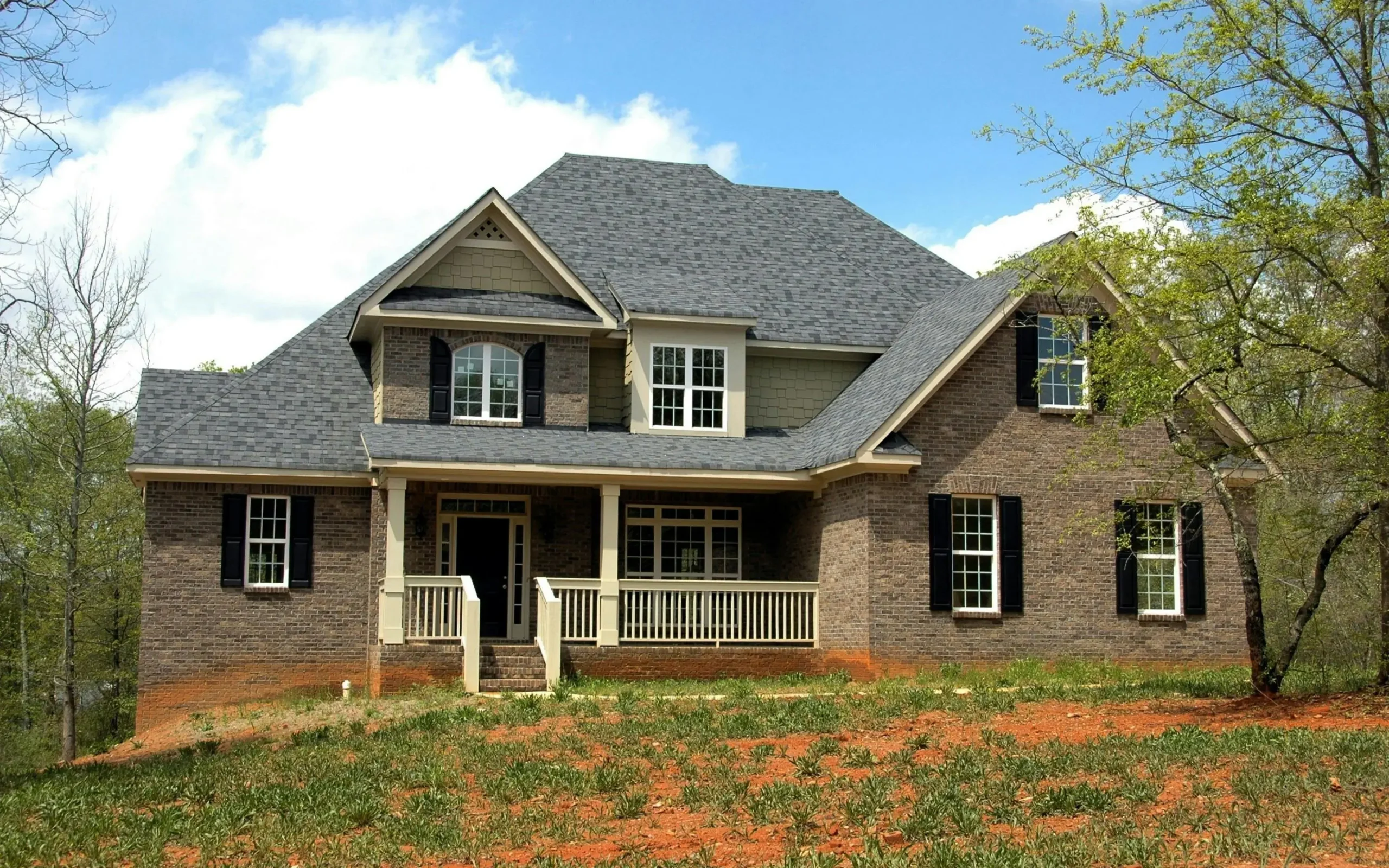 Newly installed grey bricked house in the country.